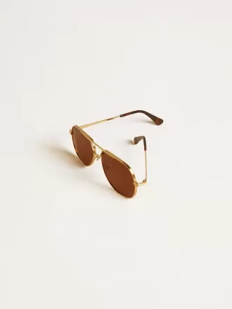 Occhiali da sole stile aviator con montatura dorata e lenti marroni