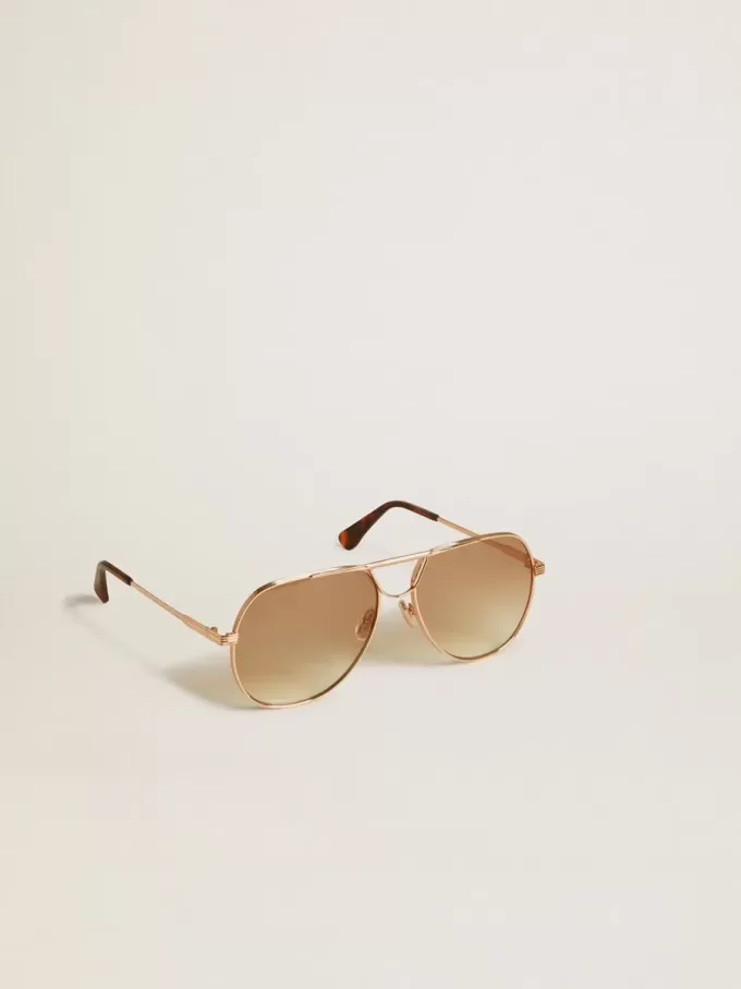 Occhiali da sole stile aviator con montatura oro rosa e lenti color miele Occhiali da sole stile aviator con montatura oro rosa e lenti color miele