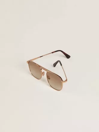 Occhiali da sole stile aviatore con montatura dorata e lenti beige