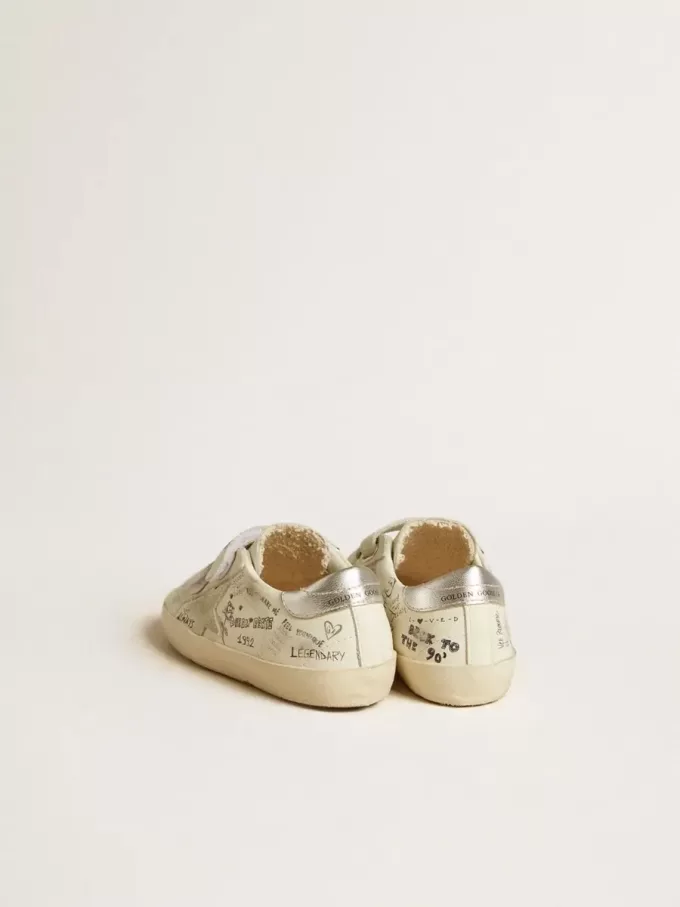 Old School Junior con stella in pelle scamosciata e linguetta sul tallone in pelle metallizzata Old School Junior con stella in pelle scamosciata e linguetta sul tallone in pelle metallizzata