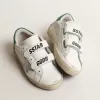 Old School Young con stella in pelle metallizzata e linguetta verde sul tallone Old School Young con stella in pelle metallizzata e linguetta verde sul tallone