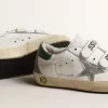 Old School Young con stella in pelle metallizzata e linguetta verde sul tallone Old School Young con stella in pelle metallizzata e linguetta verde sul tallone