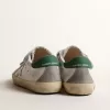 Old School Young con stella in pelle metallizzata e linguetta verde sul tallone Old School Young con stella in pelle metallizzata e linguetta verde sul tallone