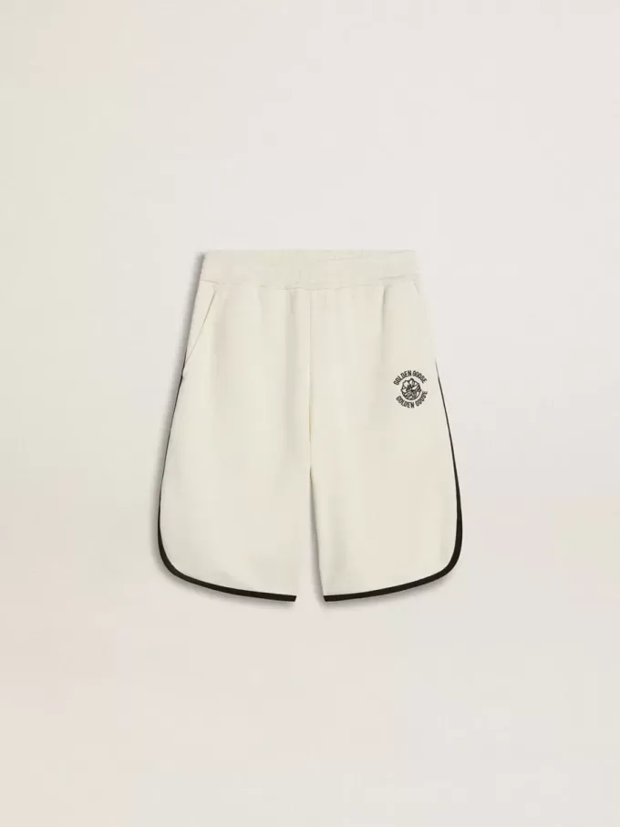 Pantaloncini bianchi da bambino con logo ricamato