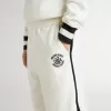 Pantaloncini bianchi da bambino con logo ricamato