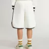 Pantaloncini bianchi da bambino con logo ricamato