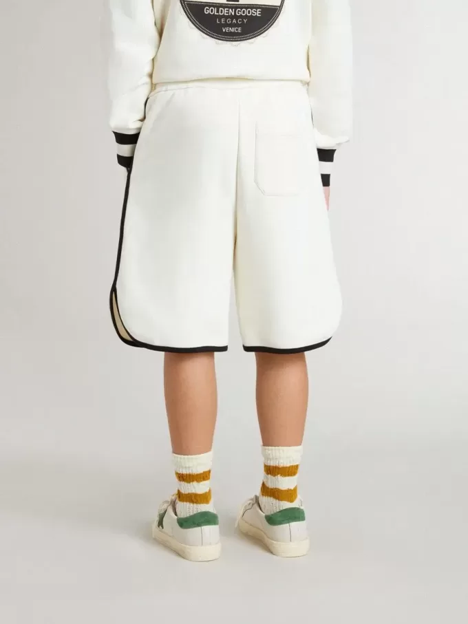 Pantaloncini bianchi da bambino con logo ricamato