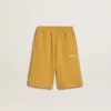 Pantaloncini da jogging per bambini in giallo ocra con ricamo
