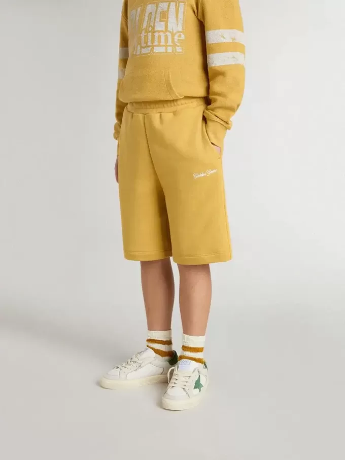 Pantaloncini da jogging per bambini in giallo ocra con ricamo