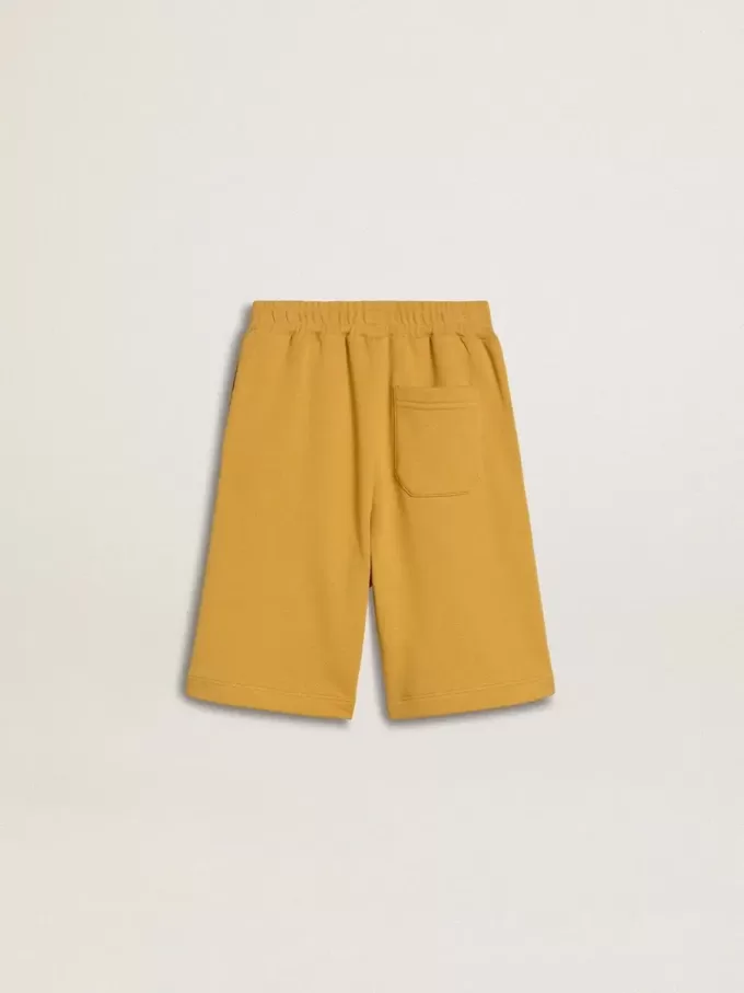 Pantaloncini da jogging per bambini in giallo ocra con ricamo