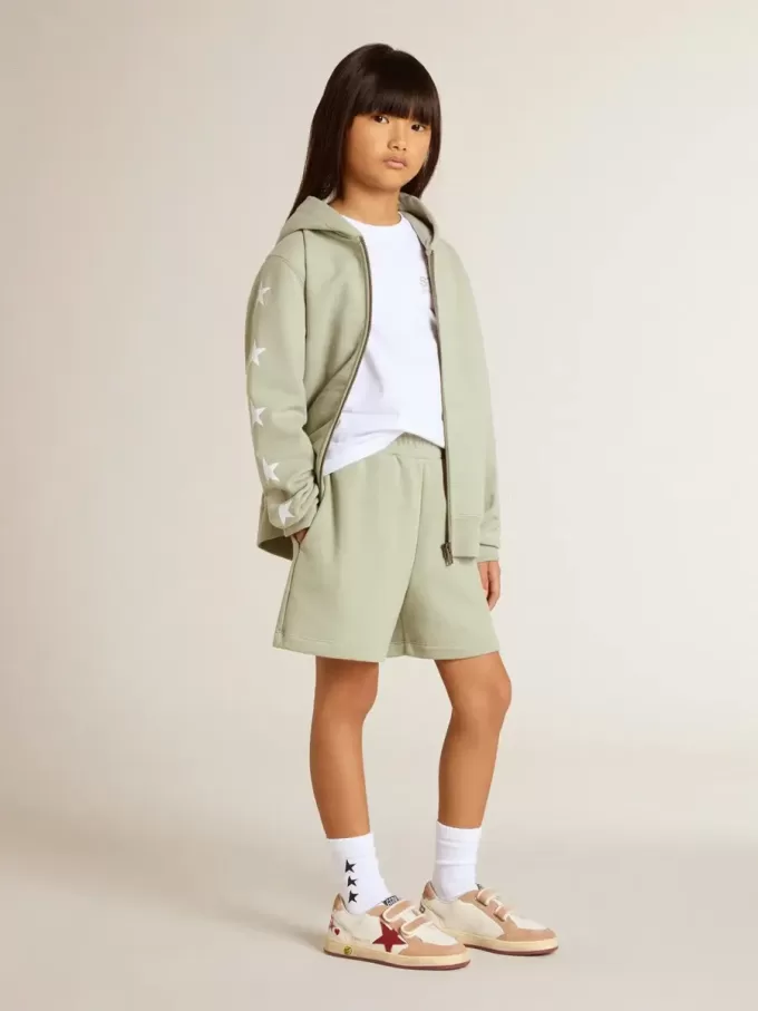 Pantaloncini verde chiaro con stella bianca Pantaloncini verde chiaro con stella bianca