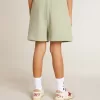 Pantaloncini verde chiaro con stella bianca Pantaloncini verde chiaro con stella bianca