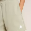 Pantaloncini verde chiaro con stella bianca Pantaloncini verde chiaro con stella bianca