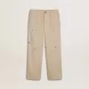 Pantaloni chino beige per bambino con spruzzi multicolori