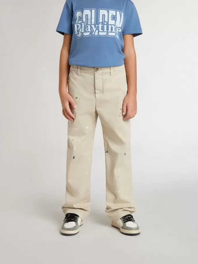 Pantaloni chino beige per bambino con spruzzi multicolori