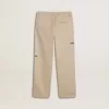 Pantaloni chino beige per bambino con spruzzi multicolori