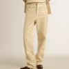 Pantaloni écru con paillettes trasparenti su tutta la superficie Pantaloni écru con paillettes trasparenti su tutta la superficie
