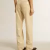 Pantaloni écru con paillettes trasparenti su tutta la superficie Pantaloni écru con paillettes trasparenti su tutta la superficie