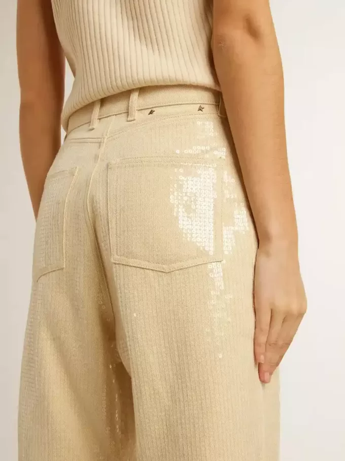 Pantaloni écru con paillettes trasparenti su tutta la superficie Pantaloni écru con paillettes trasparenti su tutta la superficie