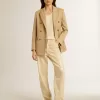 Pantaloni écru con paillettes trasparenti su tutta la superficie Pantaloni écru con paillettes trasparenti su tutta la superficie