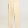 Pantaloni écru con paillettes trasparenti su tutta la superficie Pantaloni écru con paillettes trasparenti su tutta la superficie
