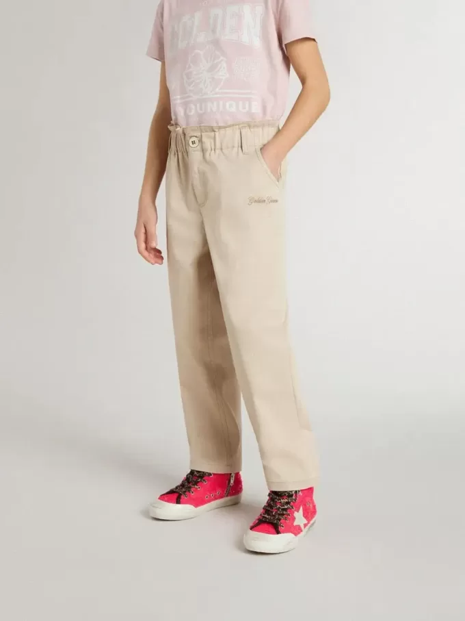 Pantaloni da bambina in cotone beige con ricamo Pantaloni da bambina in cotone beige con ricamo