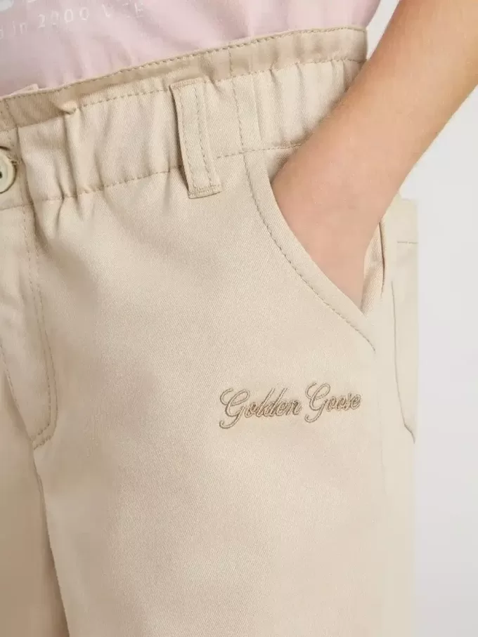 Pantaloni da bambina in cotone beige con ricamo Pantaloni da bambina in cotone beige con ricamo