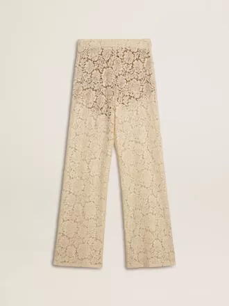 Pantaloni da donna color crema in pizzo trasparente