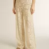 Pantaloni da donna color crema in pizzo trasparente Pantaloni da donna color crema in pizzo trasparente