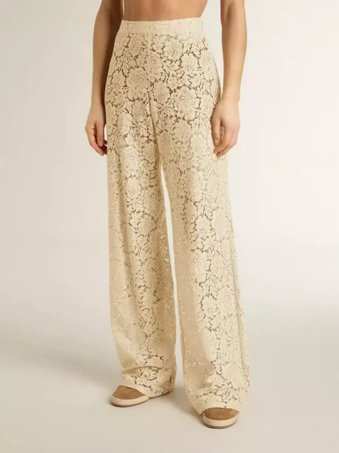 Pantaloni da donna color crema in pizzo trasparente Pantaloni da donna color crema in pizzo trasparente
