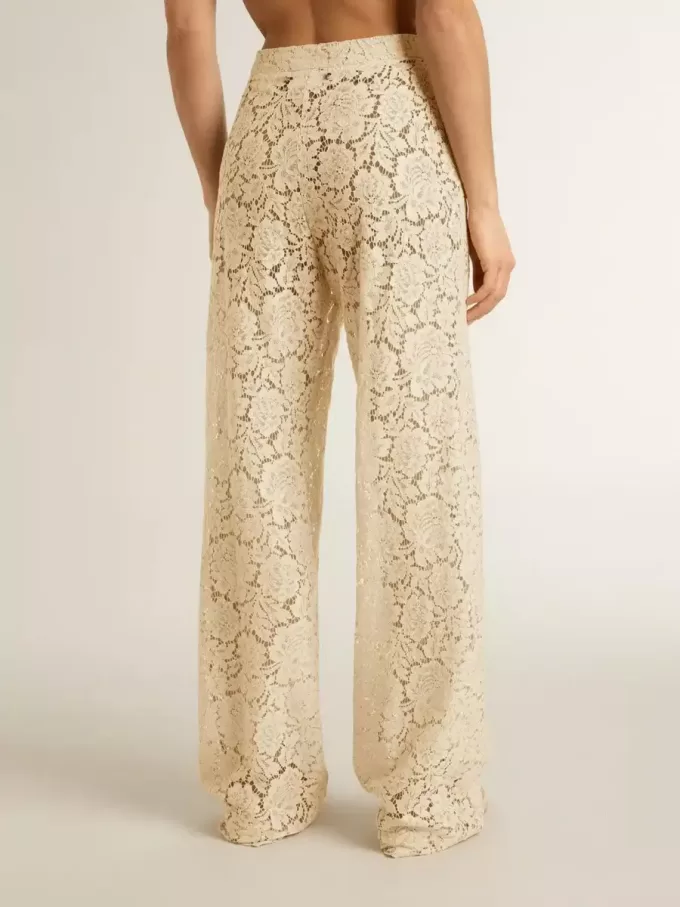 Pantaloni da donna color crema in pizzo trasparente Pantaloni da donna color crema in pizzo trasparente