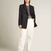 Pantaloni da donna in denim di cotone bianco ottico Pantaloni da donna in denim di cotone bianco ottico