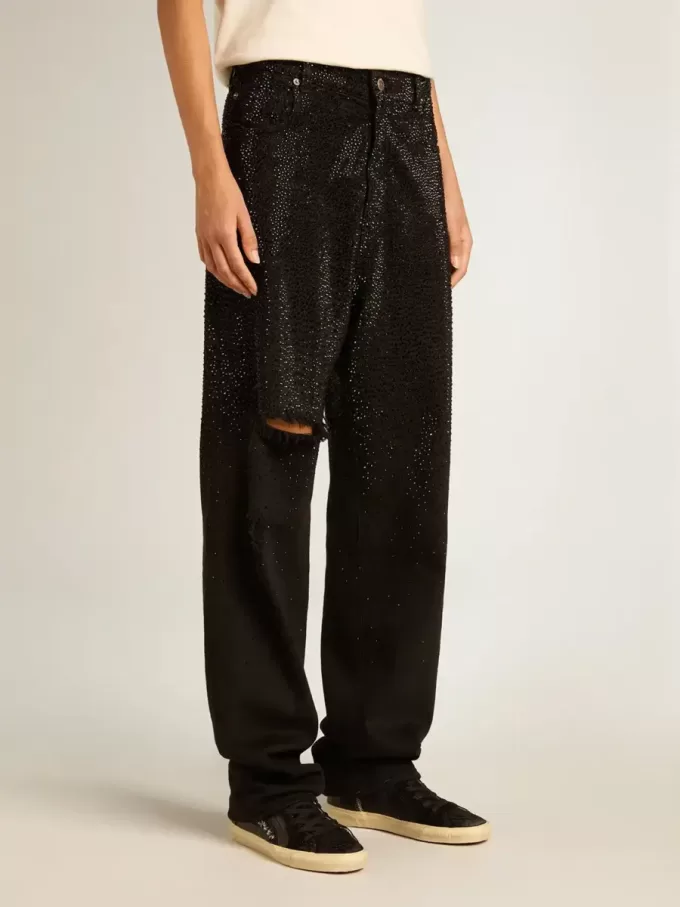 Pantaloni da donna in denim di cotone con decorazioni in cristallo effetto sfumato Pantaloni da donna in denim di cotone con decorazioni in cristallo effetto sfumato