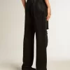 Pantaloni da donna in denim di cotone con decorazioni in cristallo effetto sfumato Pantaloni da donna in denim di cotone con decorazioni in cristallo effetto sfumato