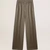 Pantaloni da donna in misto viscosa e seta verde con motivo floreale Pantaloni da donna in misto viscosa e seta verde con motivo floreale