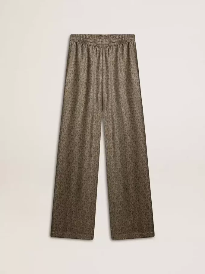 Pantaloni da donna in misto viscosa e seta verde con motivo floreale Pantaloni da donna in misto viscosa e seta verde con motivo floreale