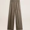 Pantaloni da donna in misto viscosa e seta verde con motivo floreale Pantaloni da donna in misto viscosa e seta verde con motivo floreale