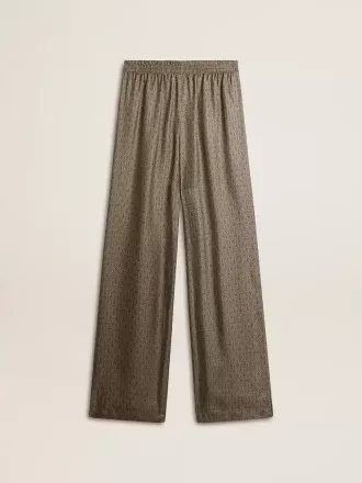Pantaloni da donna in misto viscosa e seta verde con motivo floreale