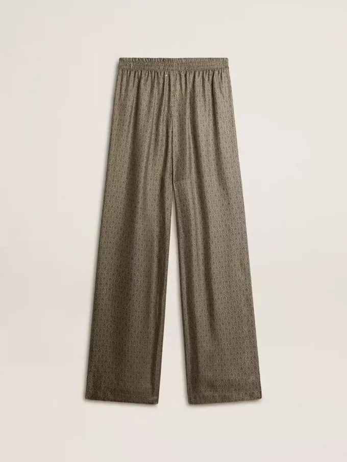Pantaloni da donna in misto viscosa e seta verde con motivo floreale Pantaloni da donna in misto viscosa e seta verde con motivo floreale