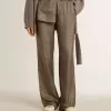 Pantaloni da donna in misto viscosa e seta verde con motivo floreale Pantaloni da donna in misto viscosa e seta verde con motivo floreale