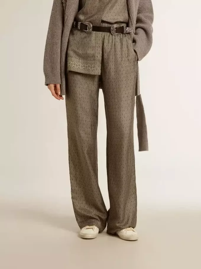 Pantaloni da donna in misto viscosa e seta verde con motivo floreale Pantaloni da donna in misto viscosa e seta verde con motivo floreale