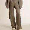 Pantaloni da donna in misto viscosa e seta verde con motivo floreale Pantaloni da donna in misto viscosa e seta verde con motivo floreale