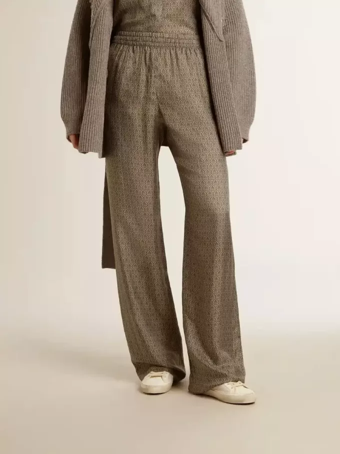 Pantaloni da donna in misto viscosa e seta verde con motivo floreale Pantaloni da donna in misto viscosa e seta verde con motivo floreale