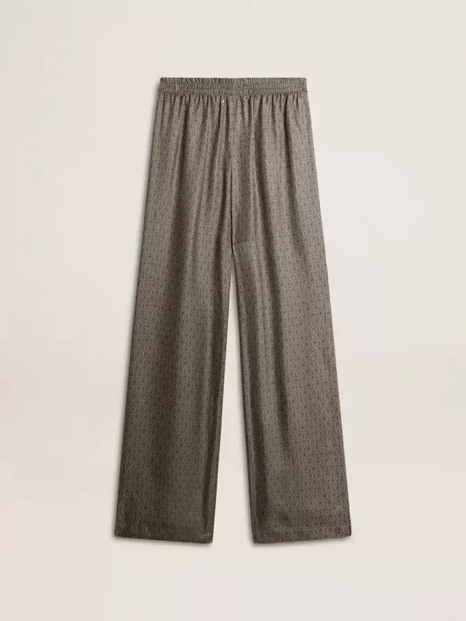 Pantaloni da donna in misto viscosa e seta verde con motivo floreale Pantaloni da donna in misto viscosa e seta verde con motivo floreale