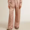 Pantaloni da donna in viscosa rosa con motivo floreale Pantaloni da donna in viscosa rosa con motivo floreale