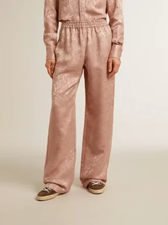 Pantaloni da donna in viscosa rosa con motivo floreale Pantaloni da donna in viscosa rosa con motivo floreale