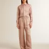 Pantaloni da donna in viscosa rosa con motivo floreale Pantaloni da donna in viscosa rosa con motivo floreale