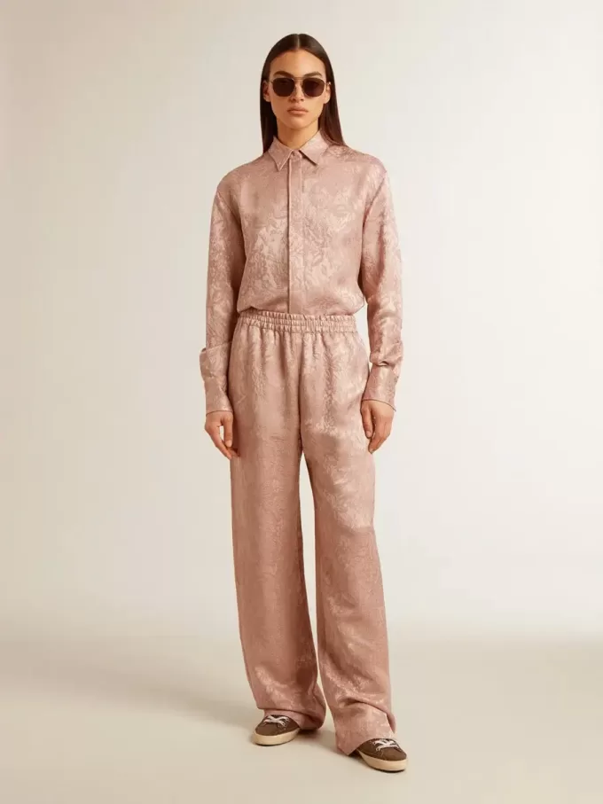 Pantaloni da donna in viscosa rosa con motivo floreale Pantaloni da donna in viscosa rosa con motivo floreale