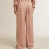 Pantaloni da donna in viscosa rosa con motivo floreale Pantaloni da donna in viscosa rosa con motivo floreale