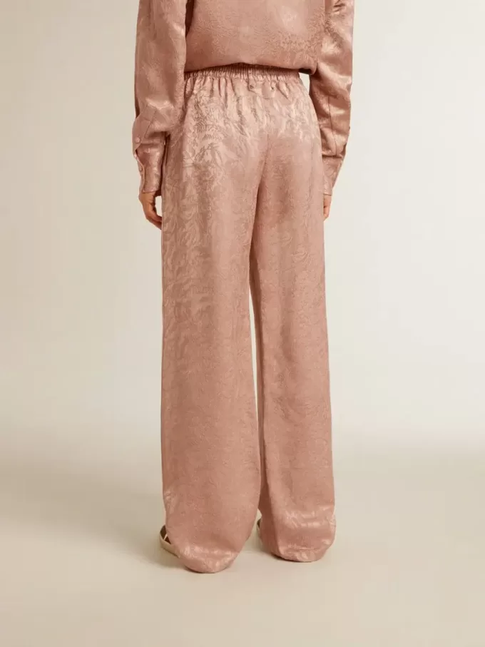 Pantaloni da donna in viscosa rosa con motivo floreale Pantaloni da donna in viscosa rosa con motivo floreale